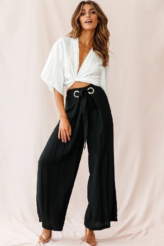 Stylish flare pants for retro party looks -Saigon Wide Leg Eyelet Pants Black