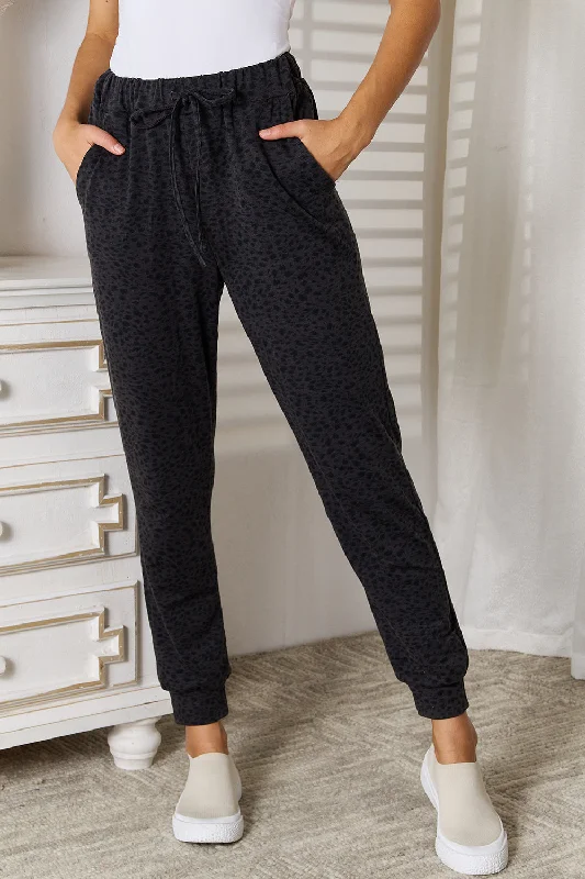 Retro bell-bottom pants for 70s-inspired fashion -Basic Bae Leopard Print Joggers with Pockets