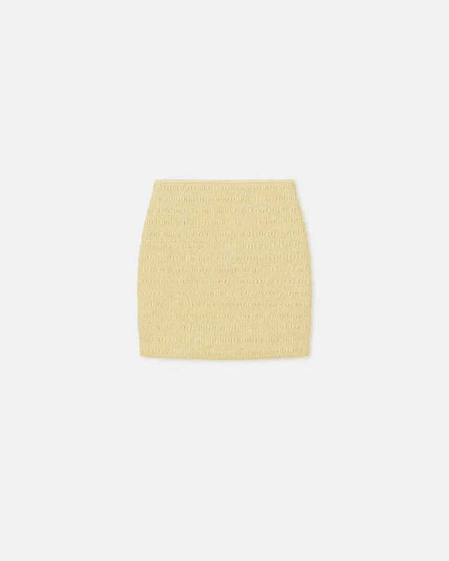 Cute skirts with playful polka dots -Ceara - SmockedOkobor™ Alt-Leather Mini Skirt - Lemongrass